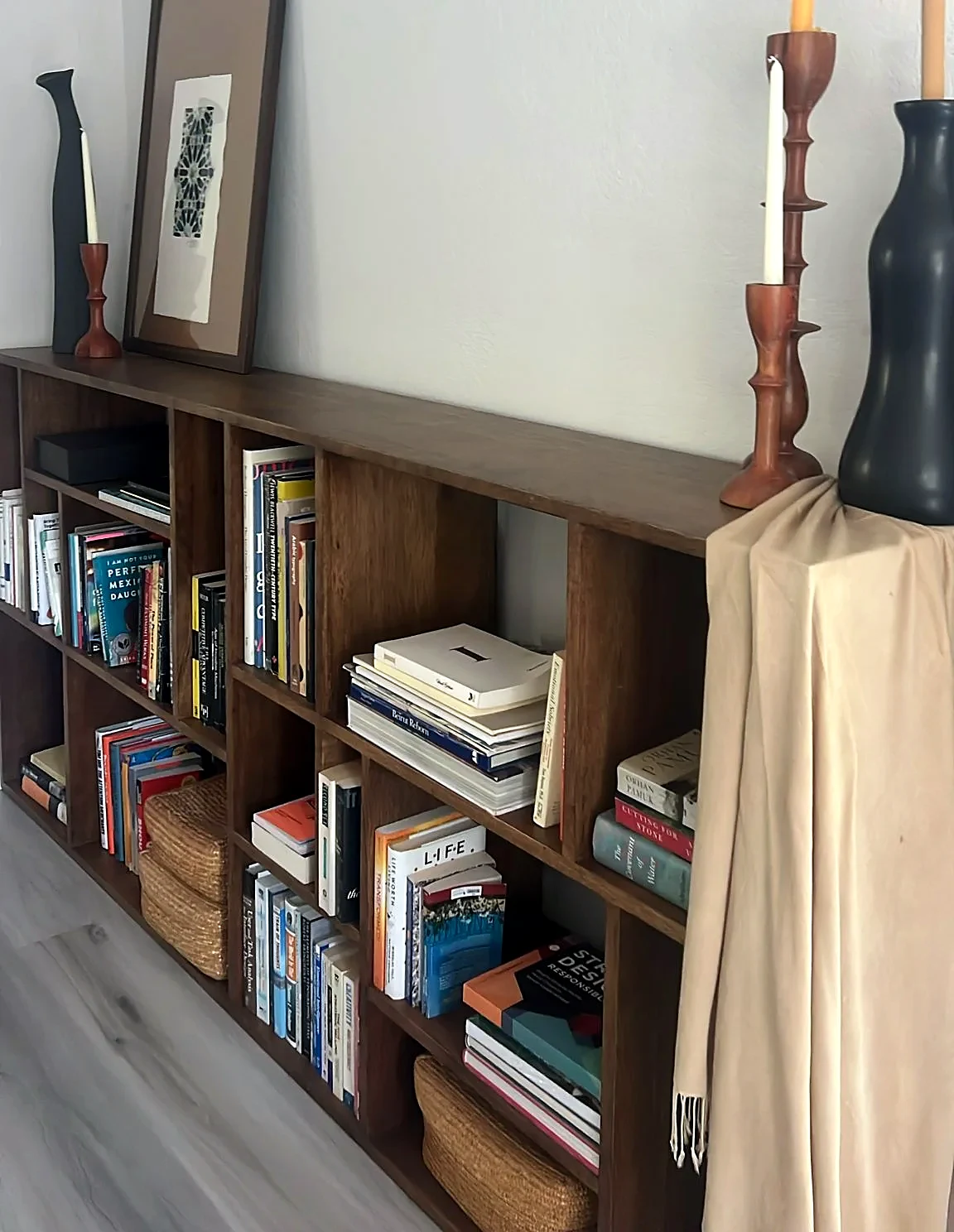 The bookshelf in the living room